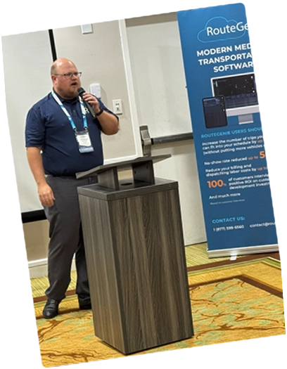 RouteGenie's co-founder Jonathon Anthon speaking at the user conference Inside The Lamp