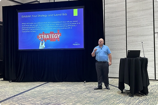 RouteGenie's co-founder Jonathon Anthon speaking at NADSA conference